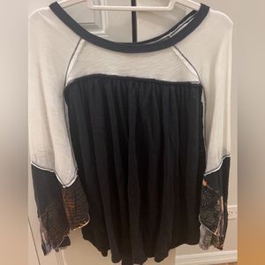 Free People Black & White top with patterned sleeves